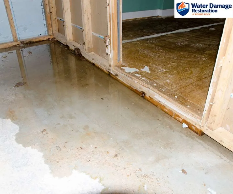 wooden wall framing studs during a flood mitigation process, as shown in water damage in Round Rock
